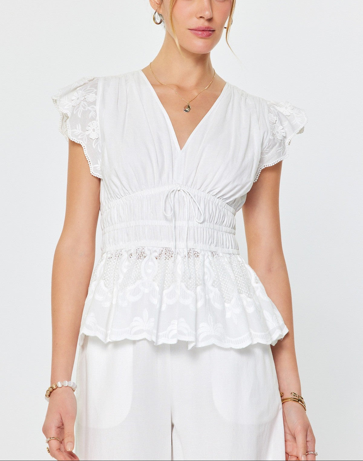 White Embroidered Peplum Blouse – v o g l i o
