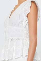White Embroidered Peplum Blouse