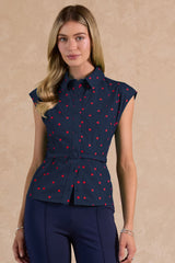 Polka Dot Belted Peplum Blouse